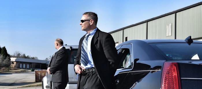 Ukhuselo protection officer in a suit
