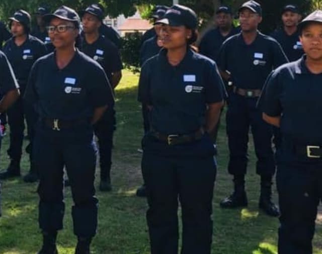 Ukhuselo security officers standing in formation in uniform